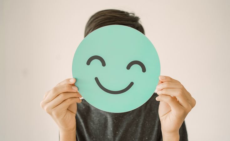 Happy,Mixed,Asian,Teen,Boy,Holding,Smile,Emoji,Face,,Positive